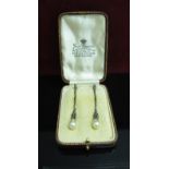 A pair of faux pearl and marcasite set drop earrings, stamped 935 in fitted box, 6.
