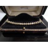 A gold diamond set bracelet, 2ct diamond total approx, stamped 14k, 19cm long, in box, 7.