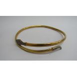 A rolled gold "snake" necklet