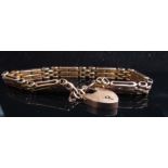 A 9ct gold bracelet with padlock clasp, 15.