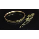 A 9ct gold bangle (dented) and a 9ct gold chain a/f, 10.