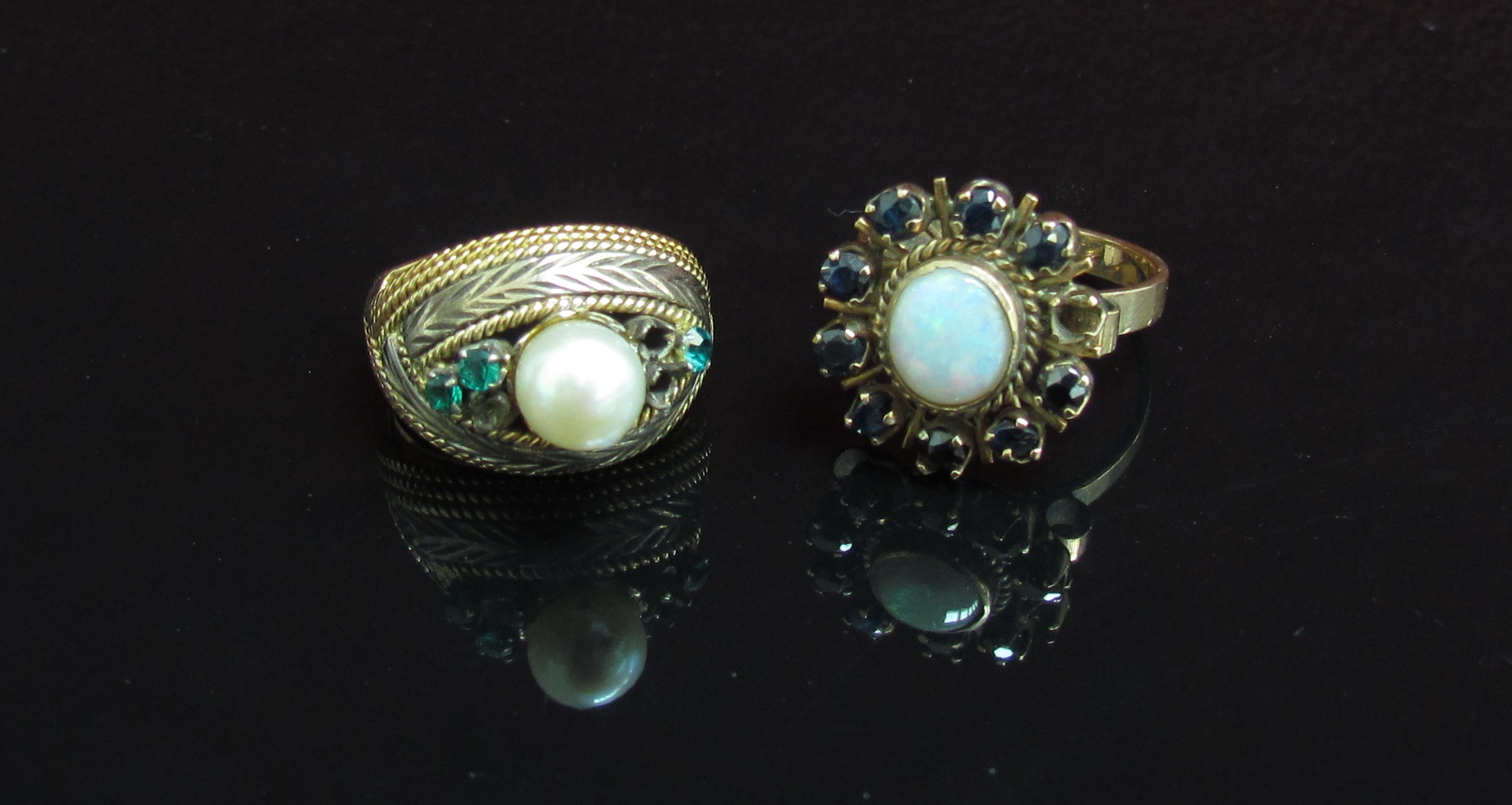 Two dress rings one with single pearl.