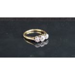 A gold platinum set three stone diamond ring, 0.45ct total approx. Size P, 3.