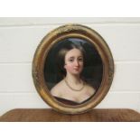 A 19th Century portrait reverse painted on glass,