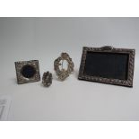 Four frames including silver