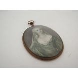 A late 19th Century portrait miniature on ivory of an elegant lady a/f