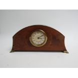 An Edwardian mounted time piece with inlaid decoration,