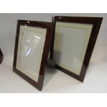 A pair of 10" x 7" easel back photograph frames