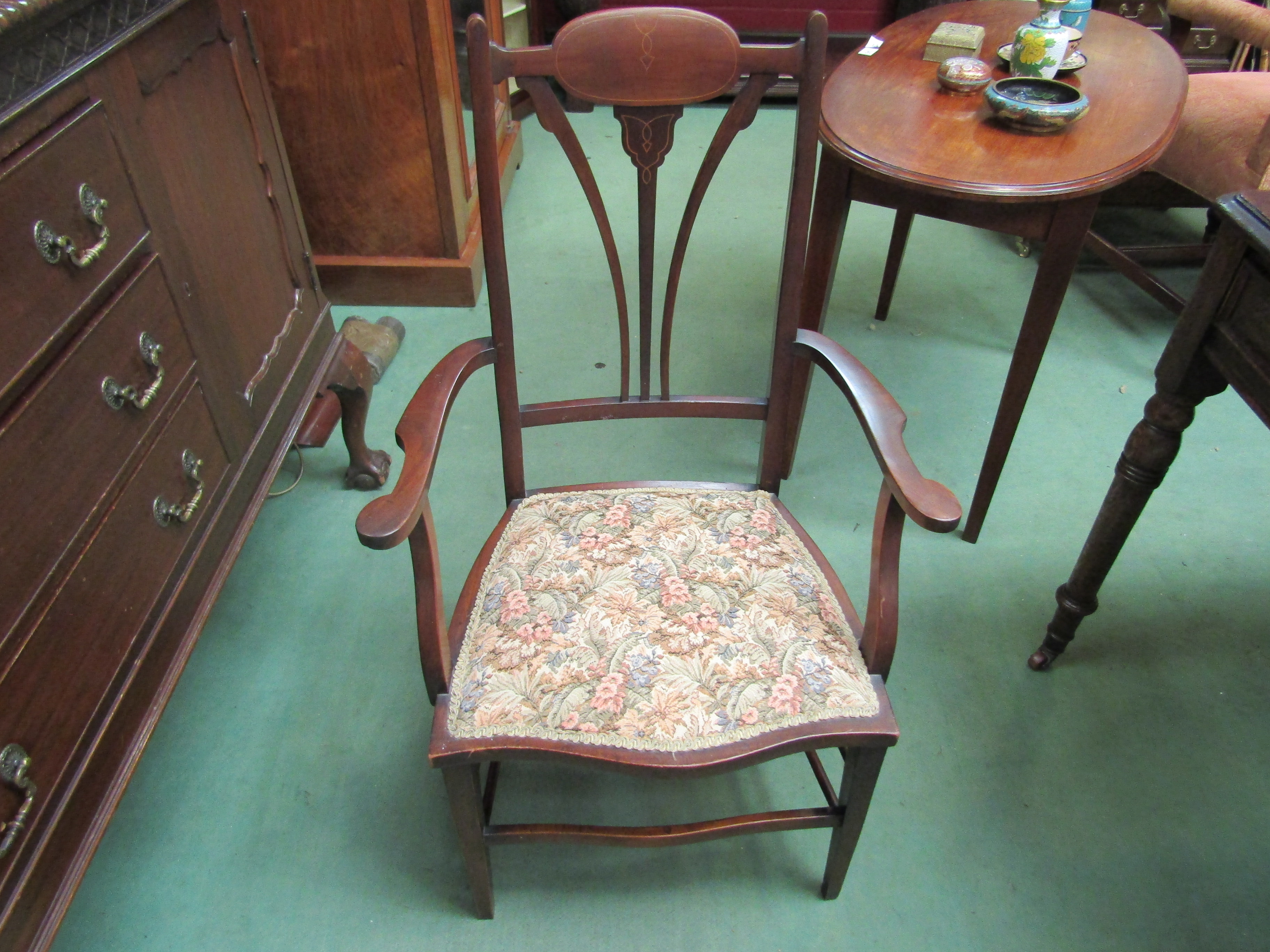 An Edwardian inlaid carver chair
