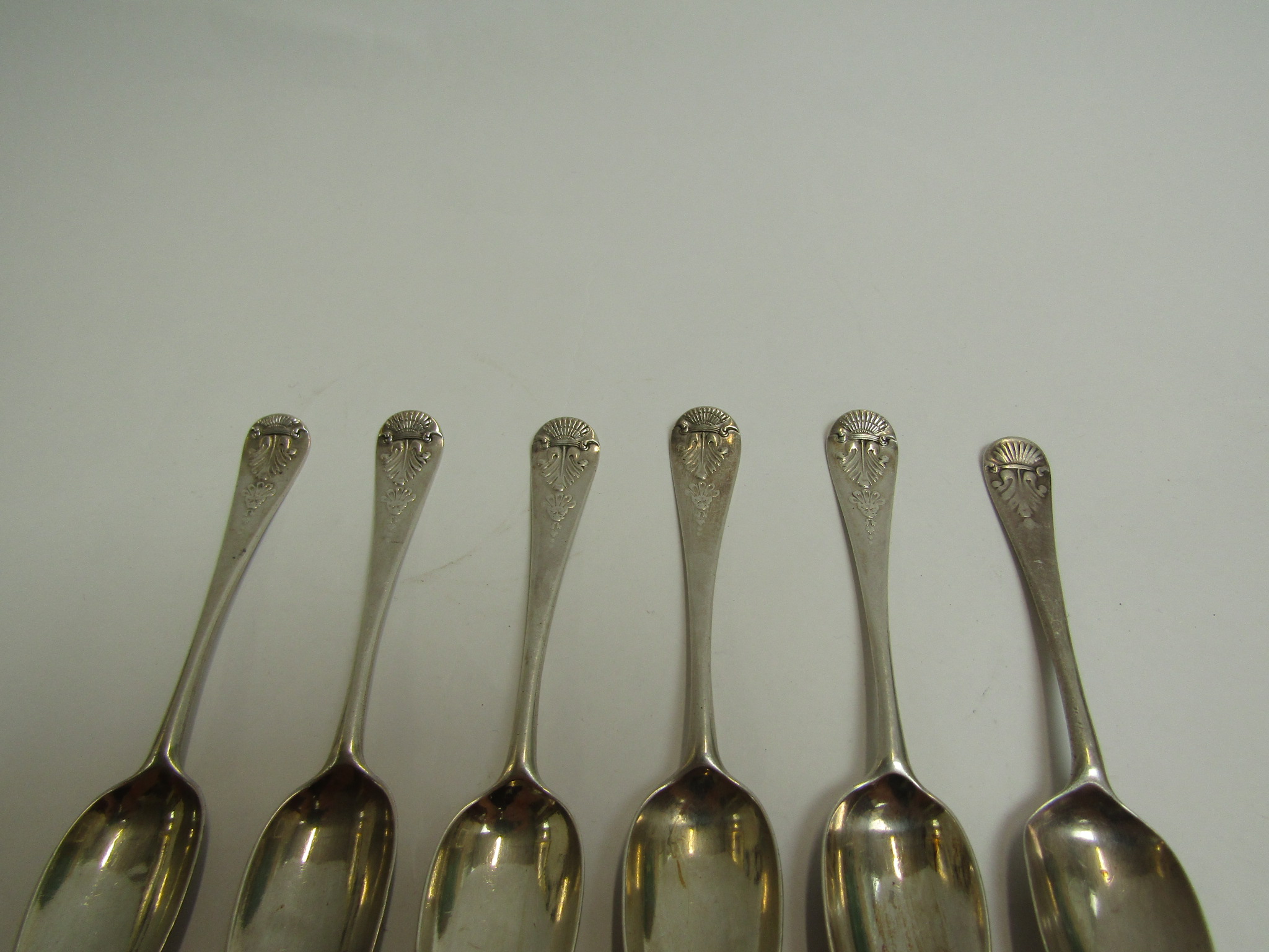 A set of six Georgian silver teaspoons, shell terminals, one with eagle engraved detail, - Image 2 of 3