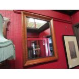 A birdseye maple rectangular cushion frame wall hanging mirror with ebony slip,