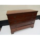 A 20th Century mahogany chest of four drawers with compartment interior.