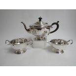 A Marson & James silver three piece tea set, beaded rims, Birmingham 1931,