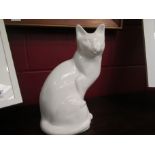 A white glazed pottery cat figure,