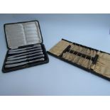 A cased set of six silver cake forks,