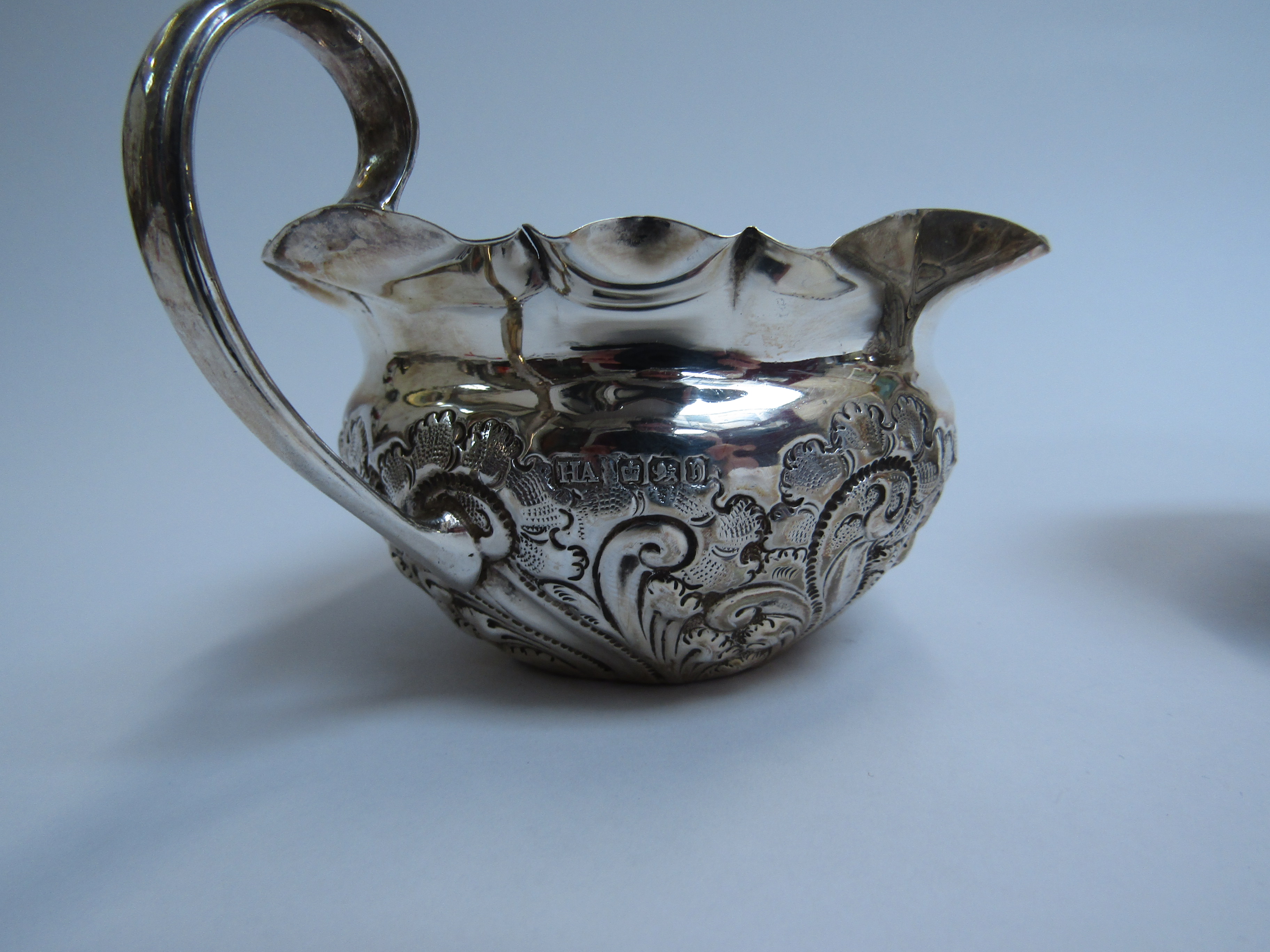 Atkin brothers silver embossed cream jug and sugar bowl Sheffield 1900 (2) 147g (split to lip of - Image 3 of 3