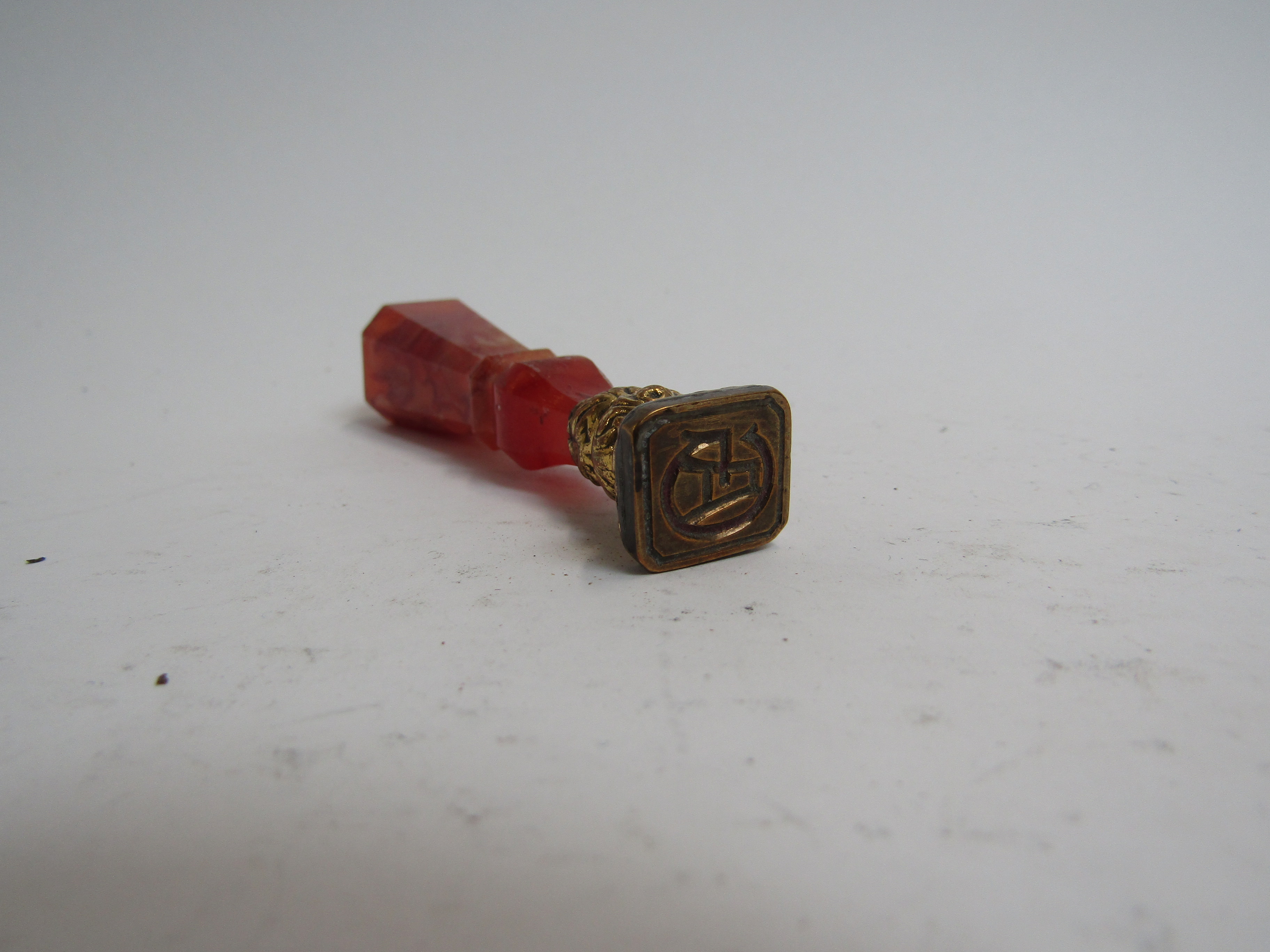 A Victorian seal with polished stone handle, 7.