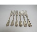 A matched set of six silver dinner forks with shell motif and vehicle engraved terminals by Chawner