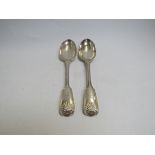 A pair of John Aldwinckle & Thomas Slater silver serving spoons with shell form and vehicle design