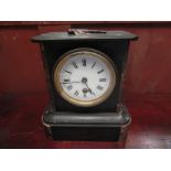 A Victorian slate and marble mantel clock with key and pendulum