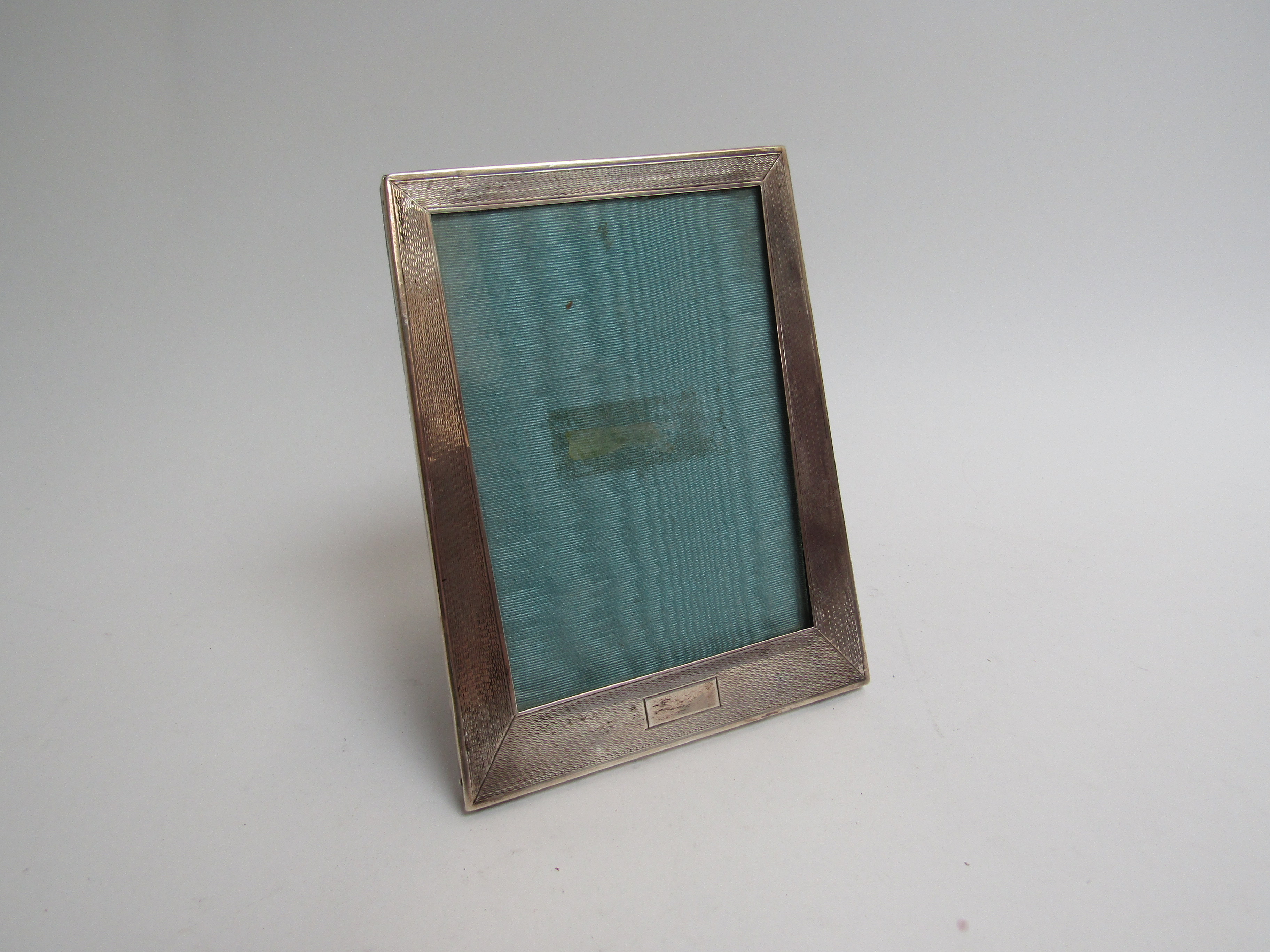 A Sanders & Mackenzie Art Deco silver picture frame, 16cm x 12.