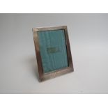 A Sanders & Mackenzie Art Deco silver picture frame, 16cm x 12.