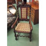 An 18th Century and later pegged oak throne chair with carved acanthus leaf and shell decoration,