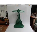 A Victorian cast iron stick stand painted green,