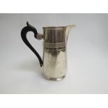 A Continental silver hot water jug with ebony handle, 18cm tall,