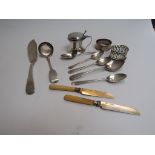 A quantity of silver items including teaspoons, sauce spoon and table salt.