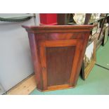 A mid Victorian mahogany wall hanging corner cupboard, interior shelving,