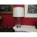 A pair of cut glass table lamps with silk pleated shades,