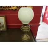 A brass oil lamp with English burner,
