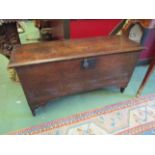 An 18th Century six plank coffer, on stile feet,