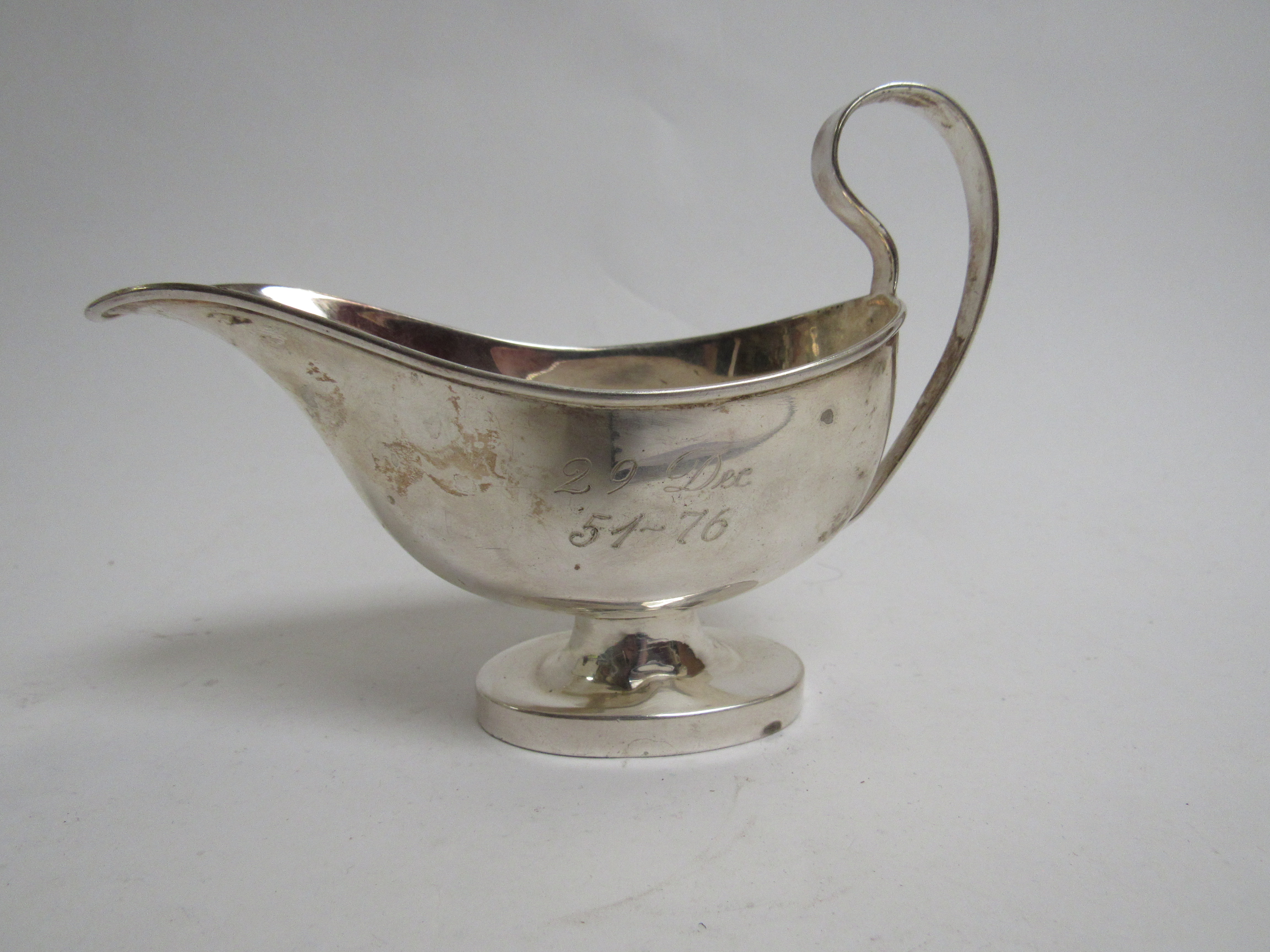 A Samuel Levi silver sauce boat (a/f) and a silver rimmed presentation ashtray, marks rubbed, - Image 3 of 3