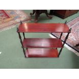 A Victorian mahogany three tier wall hanging display shelf with turned supports, 56cm x 15cm x 17.