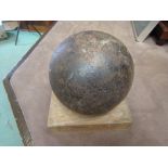A cannon ball on stand