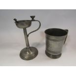 A 19th Century pewter pint tankard, stamped H.