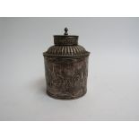 An Imported silver tea caddy of barrel form with decorative Dutch scenes, 12.