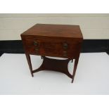 A Georgian mahogany two drawer night table with slide,