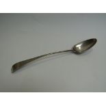 A Samuel Godbehoe and Edward Wigon silver basting/stuffing spoon, London 1799, monogrammed H,