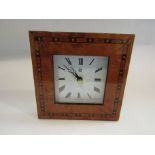 A Kienzle marquetry framed clock