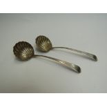 A pair of George III silver shell form sauce spoons, bright cut zigzag design,