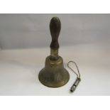 A military brass hand bell with broad arrow,