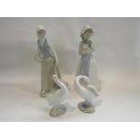 Two Lladro Nao figures of girl with goose a/f and with puppy,