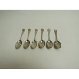 A set of six Georgian silver teaspoons, shell terminals, one with eagle engraved detail,