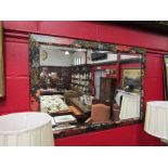 A modern bevelled edge rectangular wall mirror with William Morris style decorated frame,