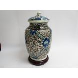 A decorative 20th Century Iznik lidded vase,