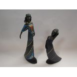 An Enesco Parastone Mahogany Princess figurine "Millennium", 30cm tall and another 23cm tall,