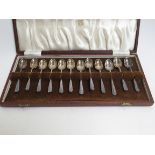 A cased set of twelve silver coffee spoons by Cooper Bros, Sheffield 1949,